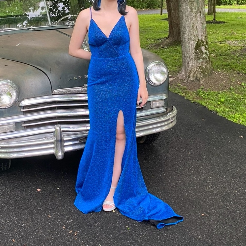 Stunning sparkly blue open back prom dress with slit and train size 0